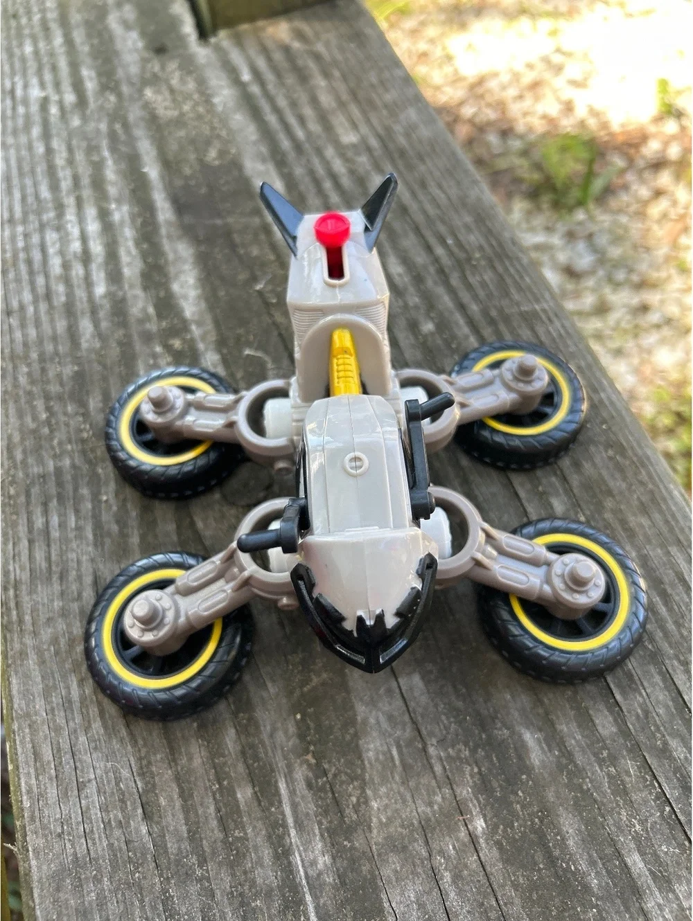 Toy Transforming  Imaginext Motorcycle with Four Wheels and Red Button